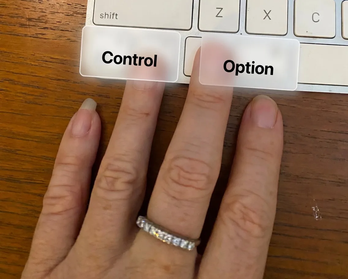 Keyboard showing the Control and Option keys for the ClawSight shortcut.